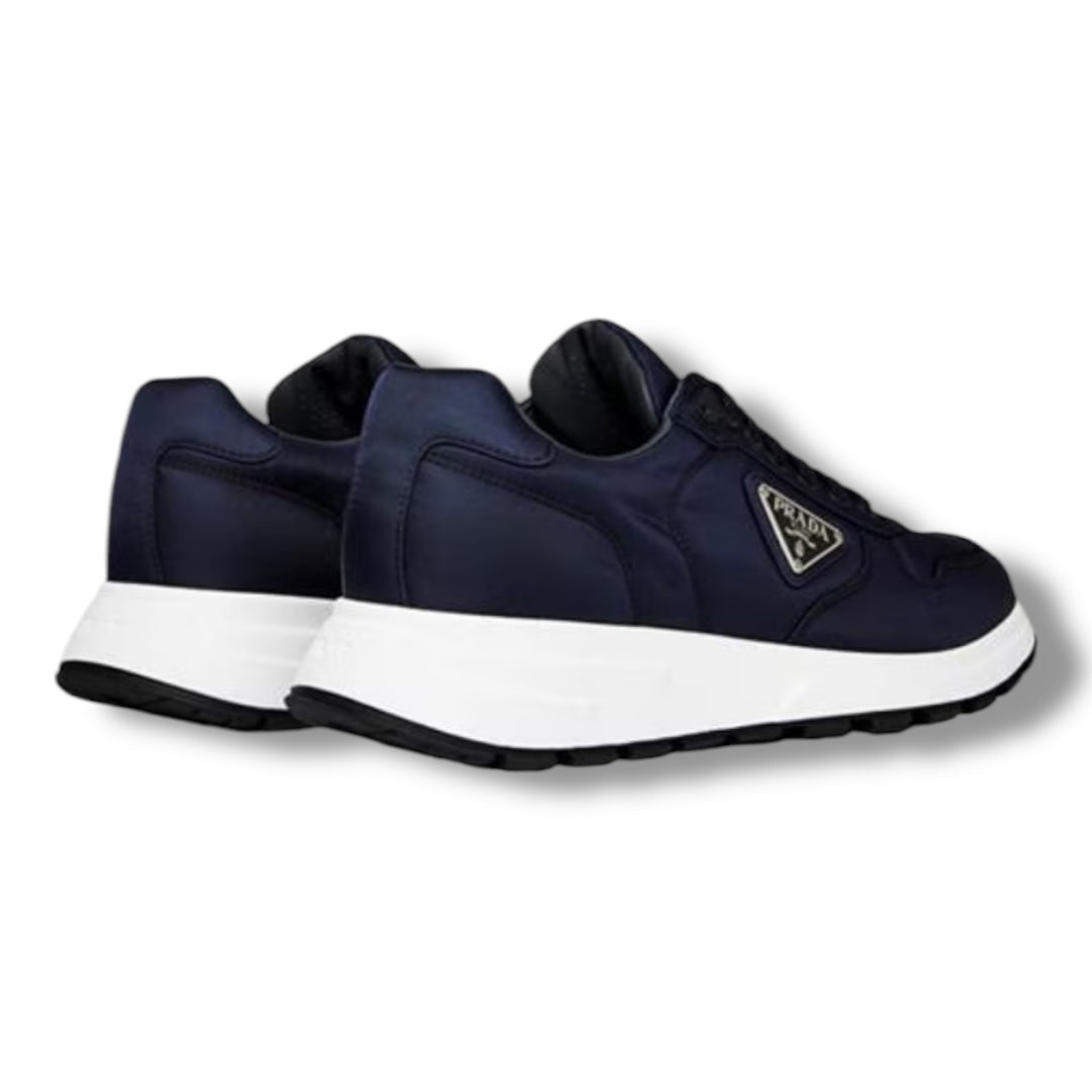 PRADA RE-NYLON TRIANGLE LOGO TRAINERS NAVY BLUE