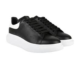 ALEXANDER MCQUEEN LEATHER OVERSIZED TRAINERS BLACK / WHITE